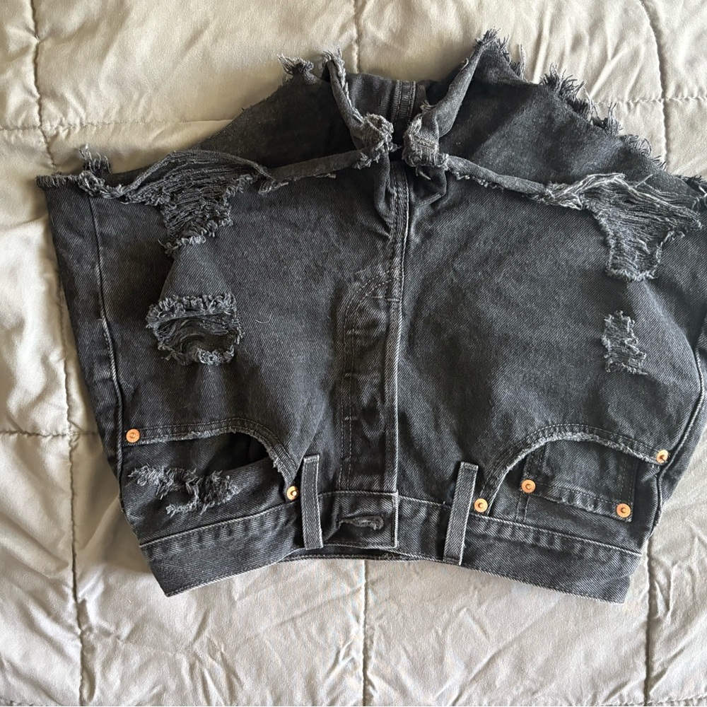 Levi’s Distressed Black Denim Shorts